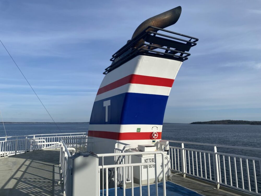 Different Parts Of Ship And Its Function | An Easy Guide 8 Funnel on a passenger ferry with the company logo