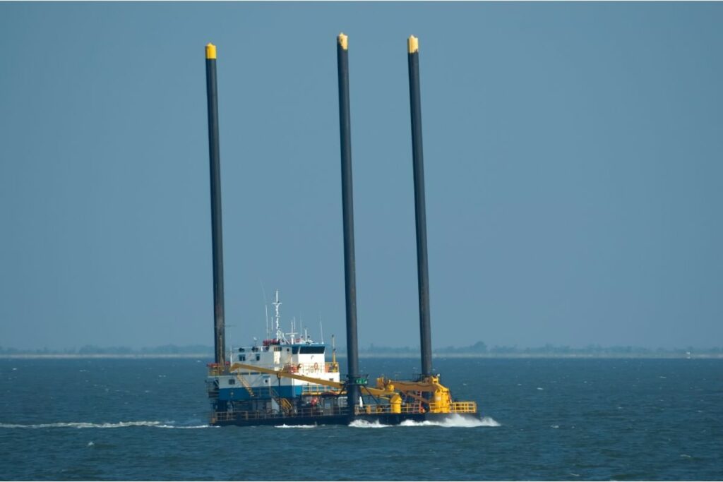 Liftboat underway using own marine propulsion system.