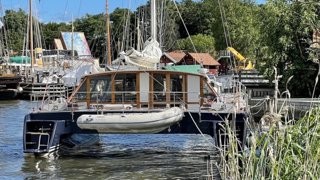 Sailing catamaran in harbor