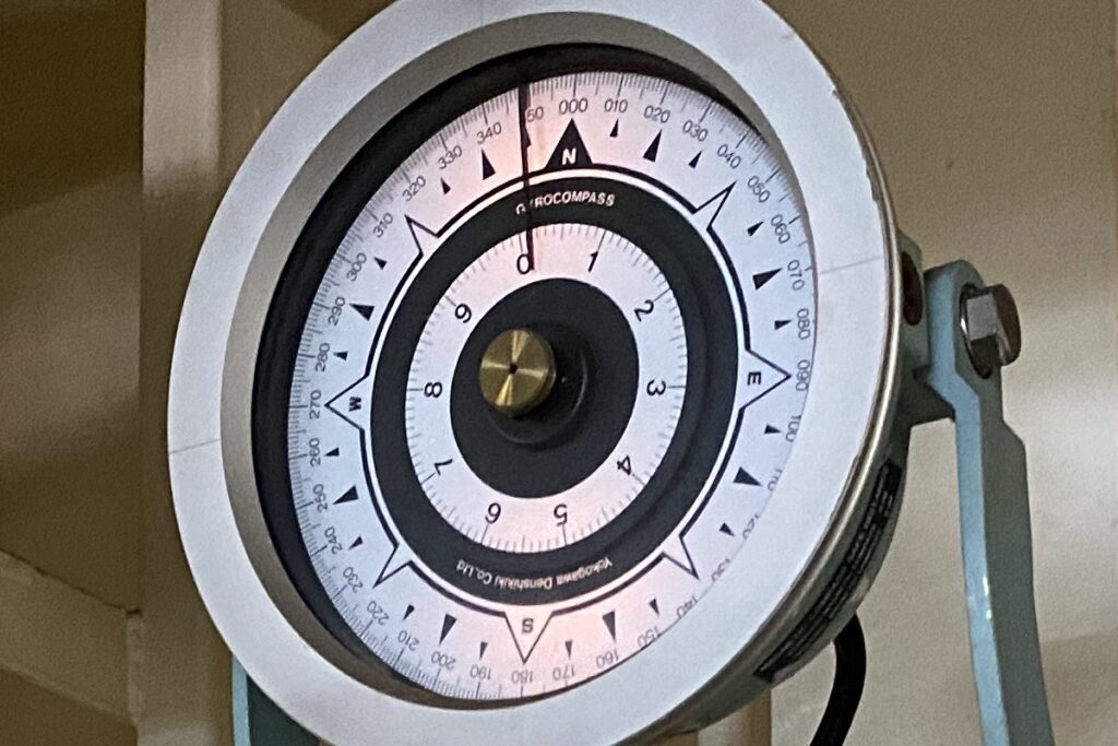 Gyrocompass with directions in the steering room