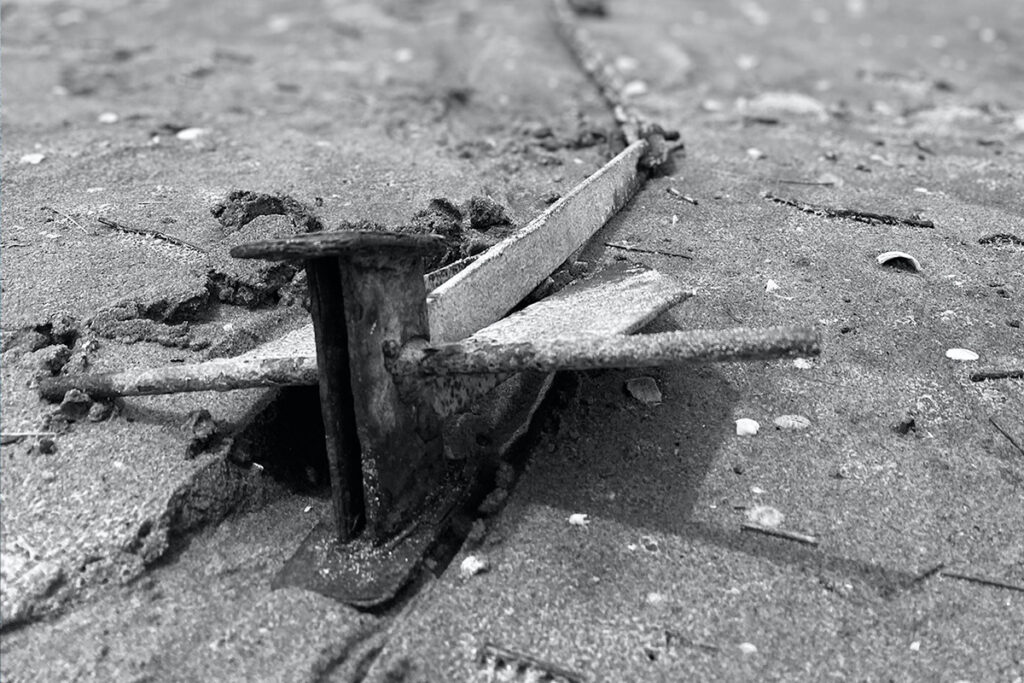 Fluke Anchor in sand on the beach