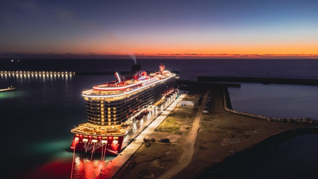 Virgin Lady Cruise Ship with Lights Docked on a Pier