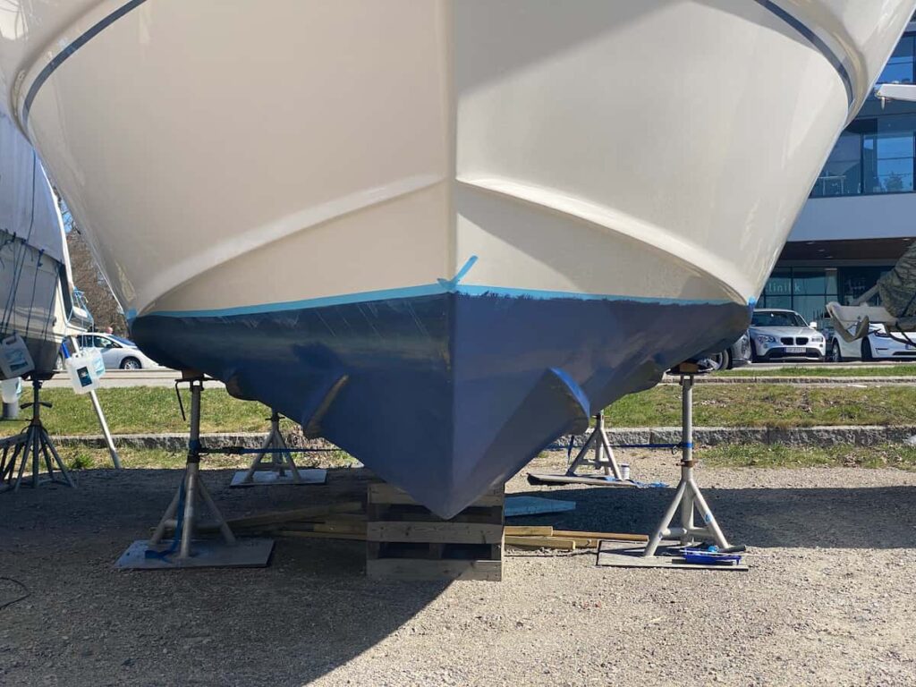 Fiberglass boat hull repair gelcoat before painting with marine paint