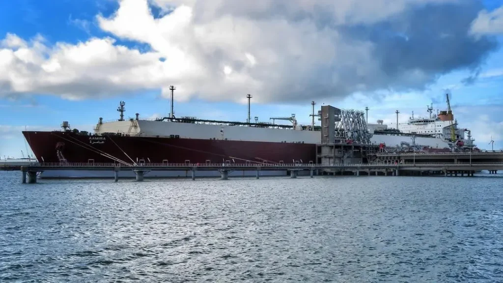 Massive LNG gas carrier tanker ship Aamira docked at Port of Zeebrugge