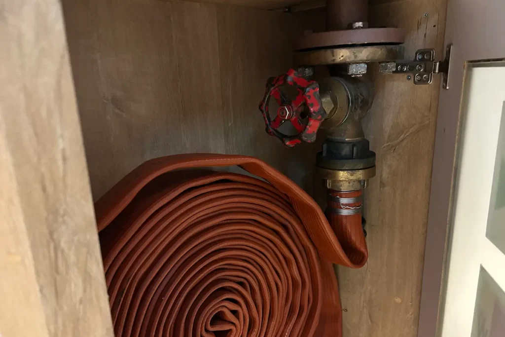 Fire Hose permanently connected to fire main on the passanger ship